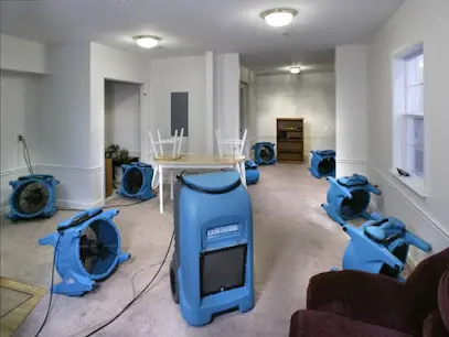 Air movers and dehumidifiers drying a Converse, TX room after water damage