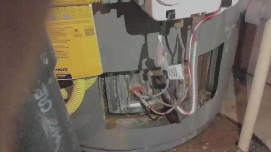 A failed water heater flooding a garage floor in Converse, TX